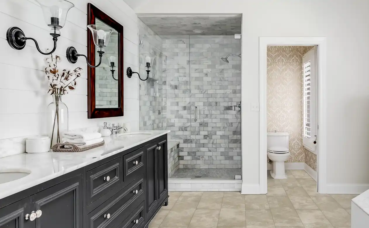 Tile floor and custom tile shower in a bathroom. 